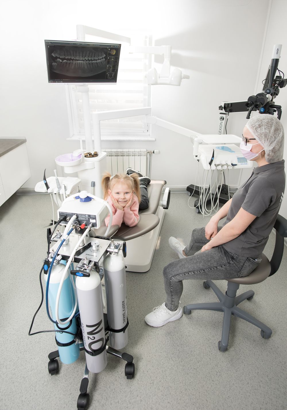 A relaxed young patient with the nitrous oxide sedation equipment